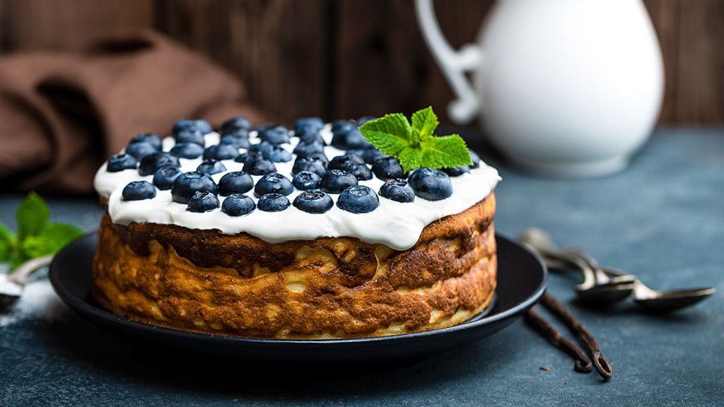 blueberry-cake-with-fresh-berries-and-whipped.jpg